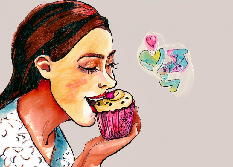 uma mulher comendo cupcake